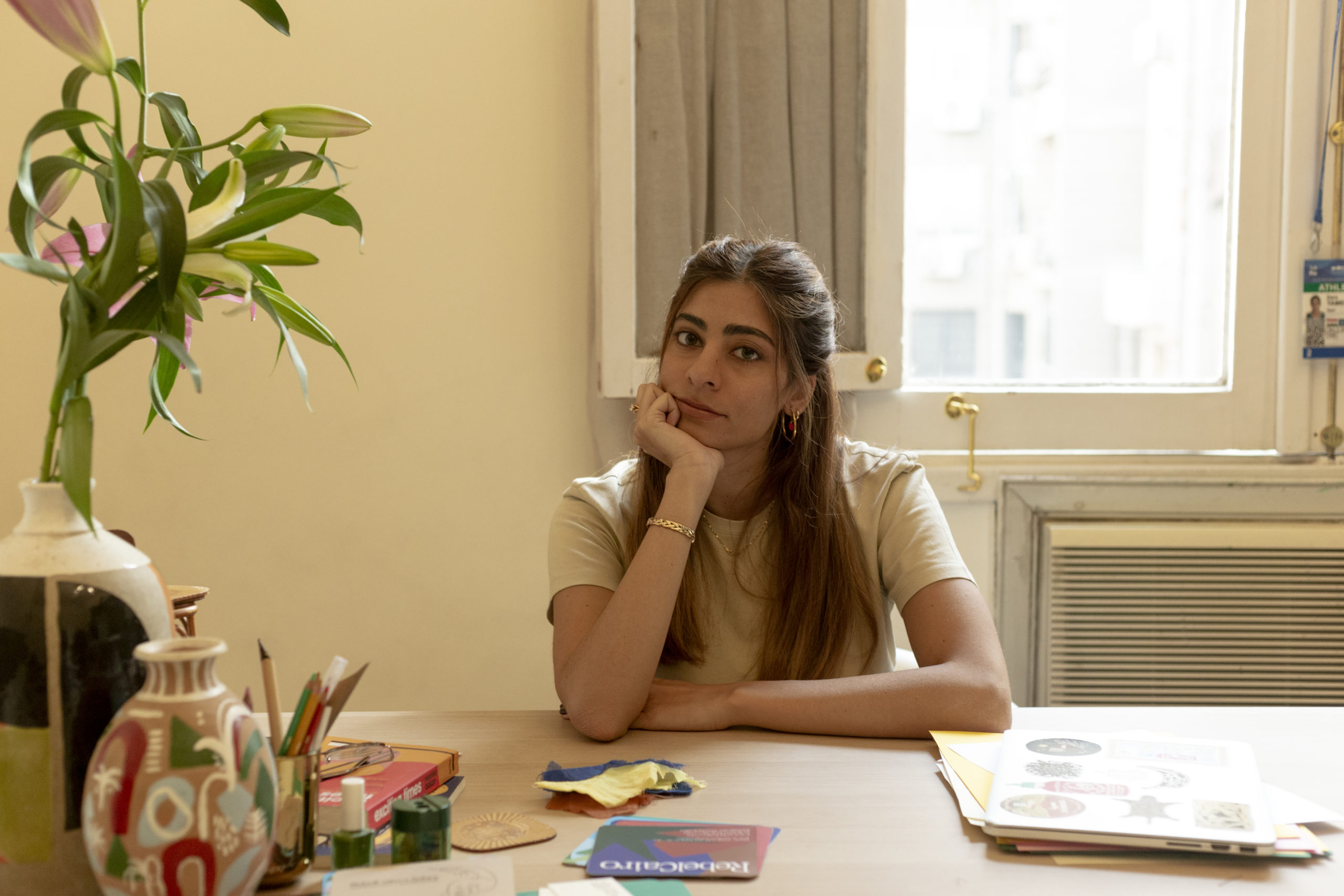 a portrait of Dara Hassanein on her desk 